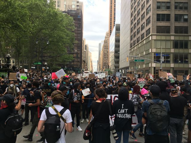 Hundreds in the street on 6th Avenue near Bryant Park